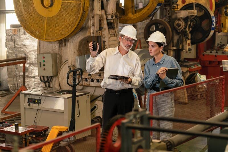 Compliance — factory audit with hard hats safety equipment and inspection protocols